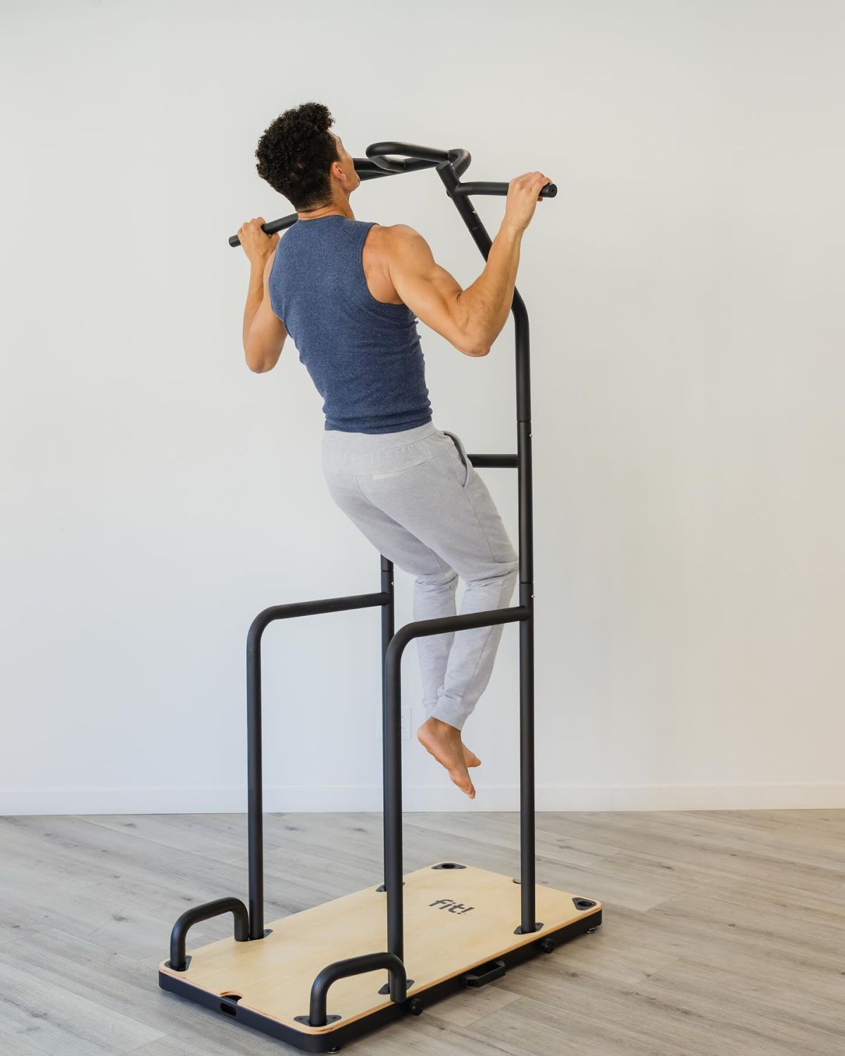 Man doing exercise on fit home gym