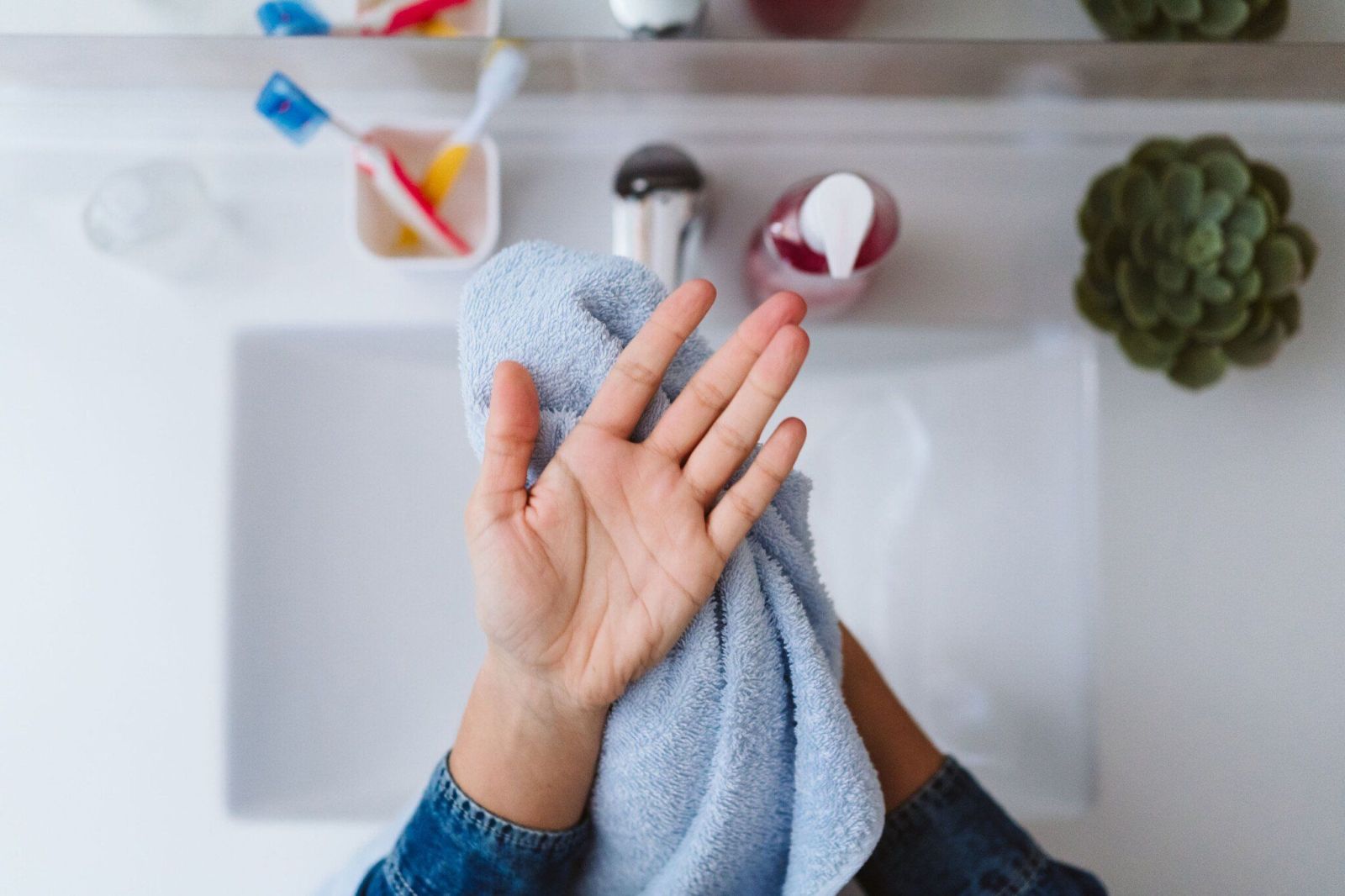 Resize unrecognizable woman drying hands with towel after 2023 11 27 04 53 58 utc