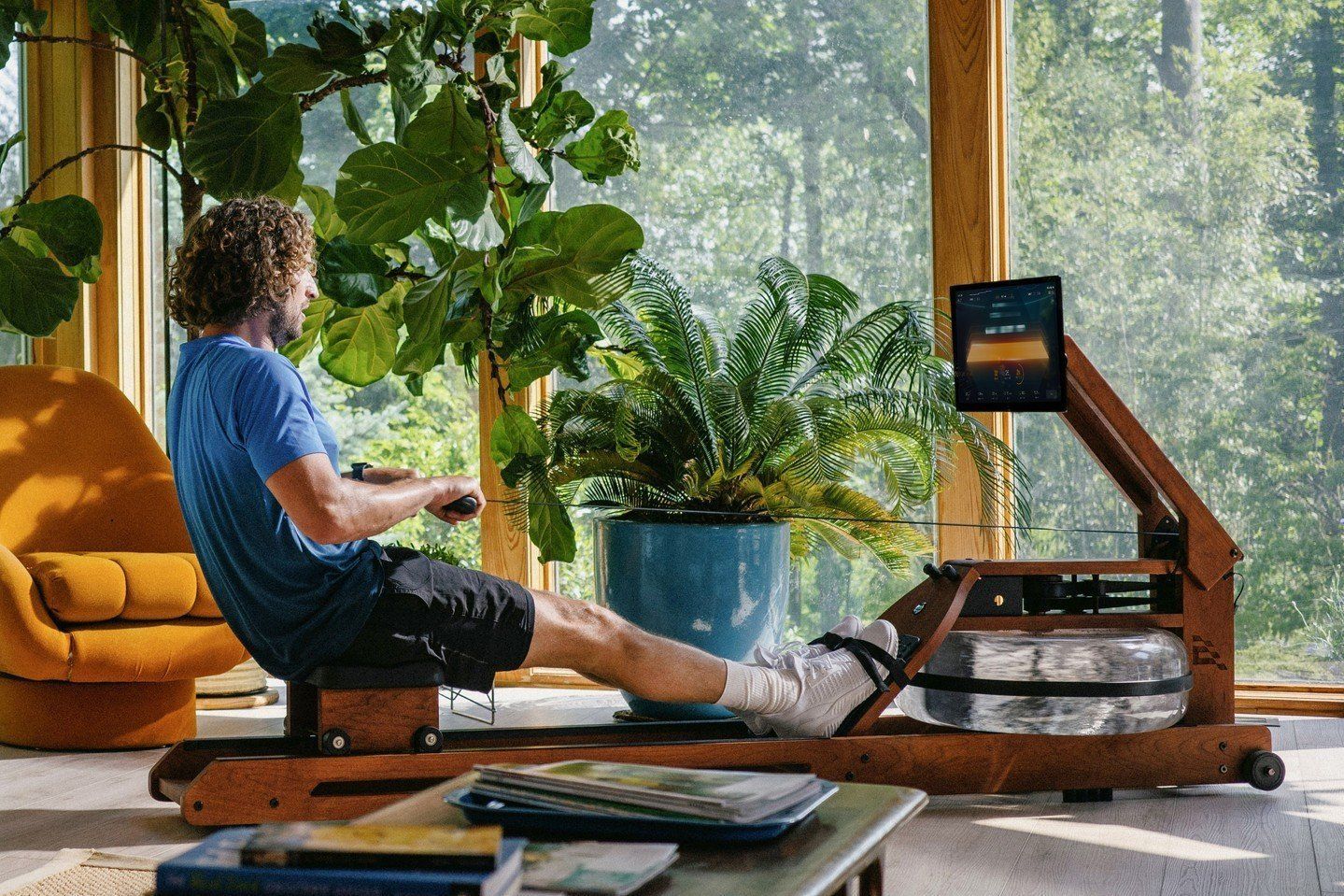A person using egratta rower at home